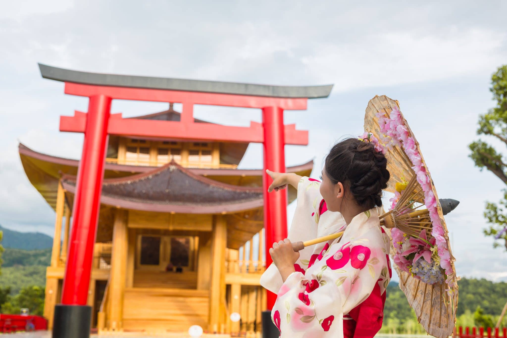 Asia Global Yachting (AGY) Premium Bespoke Yatch Charters, Sales, New Builds, Management & More A Beautiful Asian Woman Wearing A Japanese Kimono, Traditional Dress Concept.