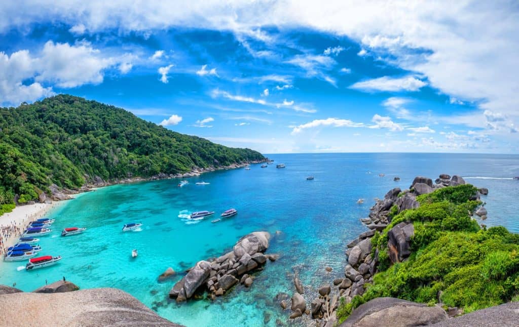 Thailand destination Similan Islands with a rocky beach and blue skies