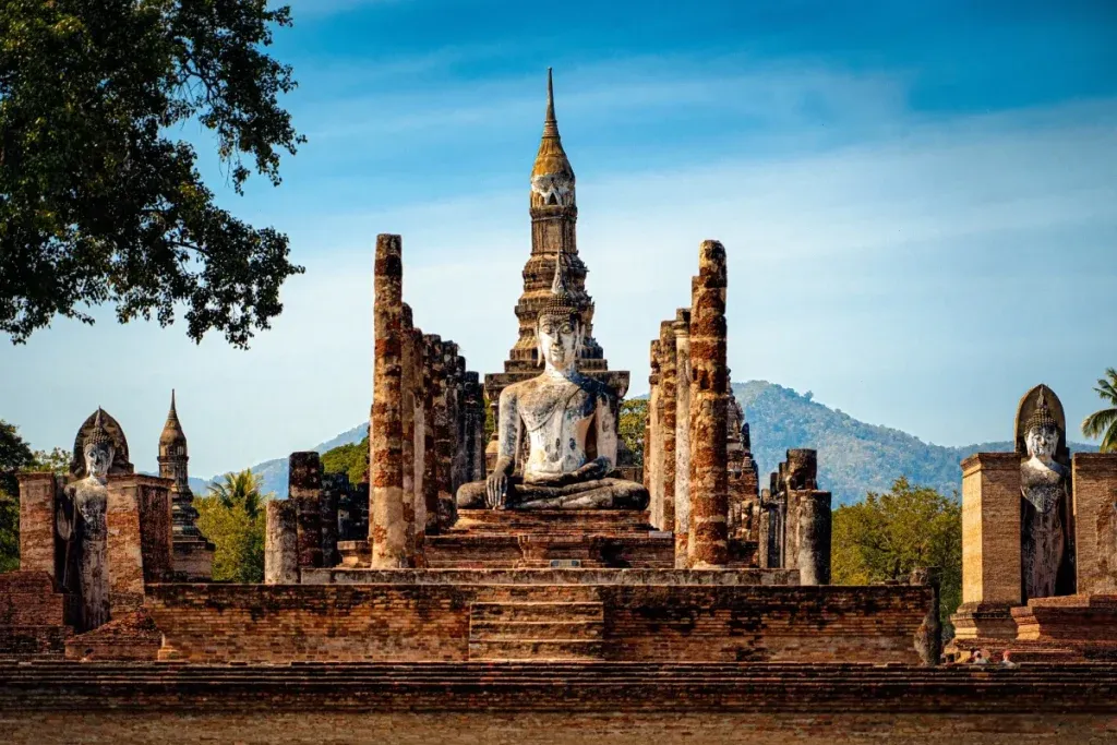 Thailand destinations image showing Sukhothai Old City with a temple and mountain background